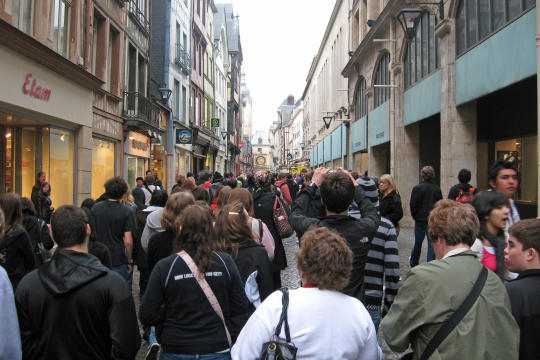 Street with big clock in Rouen
